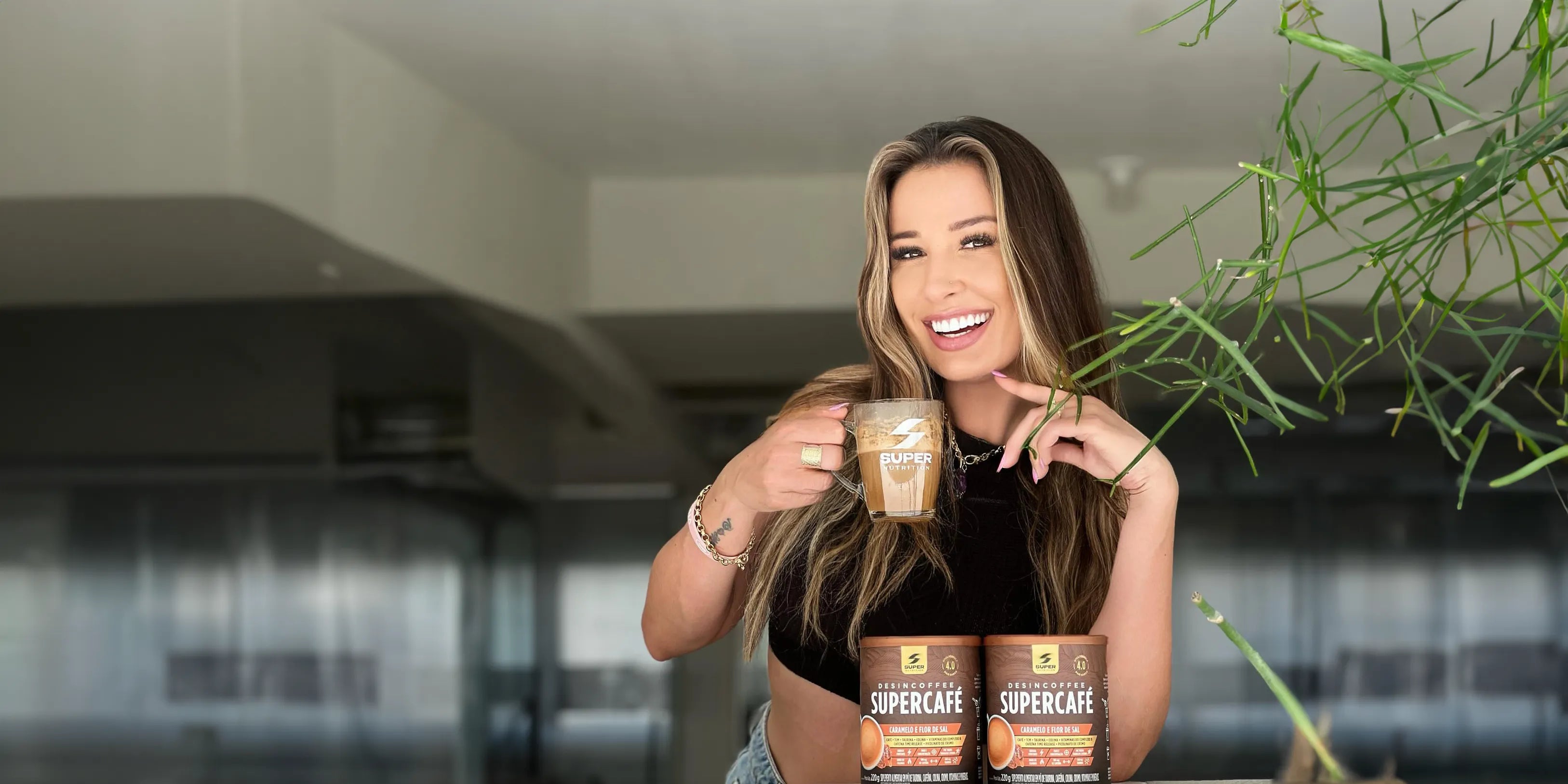 Woman drinking Desincoffee and showcasing different flavours