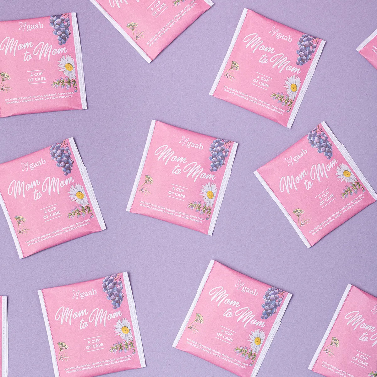GAAB Mom to Mom tea sachets spread out with a maternal touch, symbolizing the nurturing essence of motherhood in a cup of care.