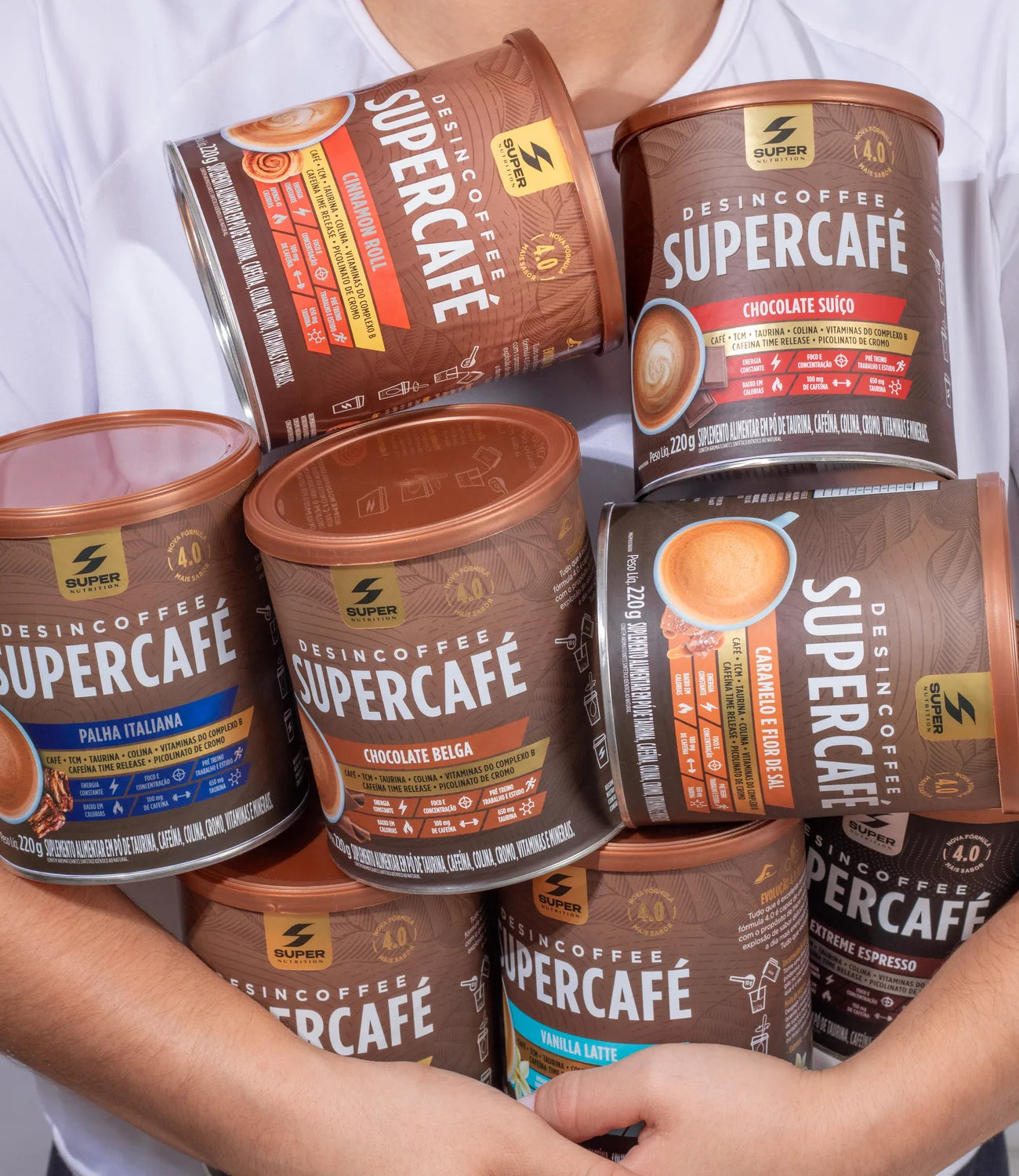 Energy & Performance mobile banner, armful of Desincoffee tins