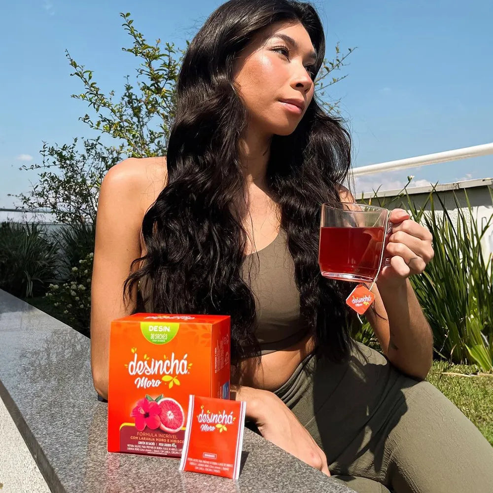 Woman drinking Desinchá Moro