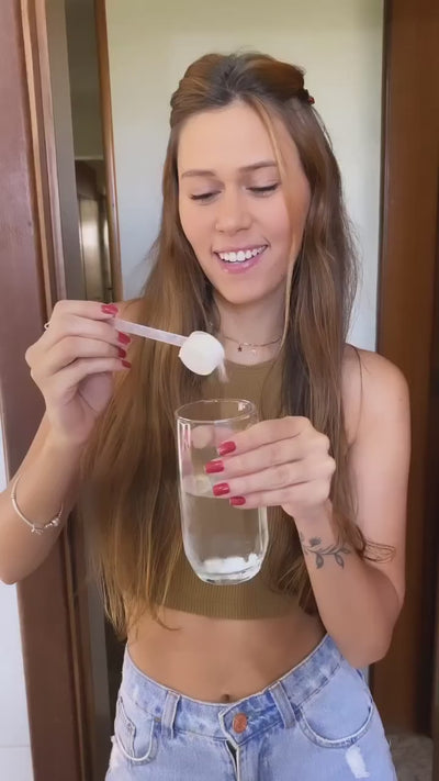 Mother and daughter happily drinking collagen for healthy and youthful skin