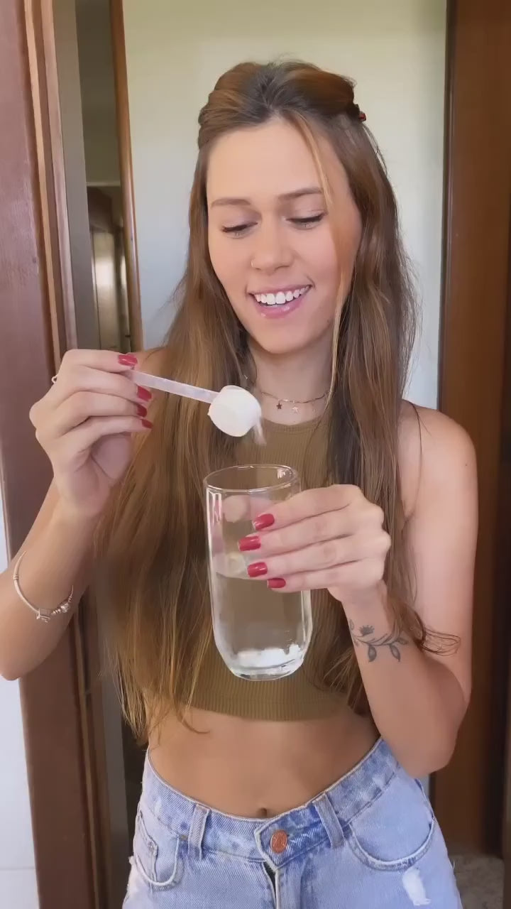 Mother and daughter happily drinking collagen for healthy and youthful skin